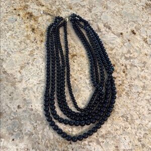 Matte Black Multi-Strand Beaded Necklace with Layered Design